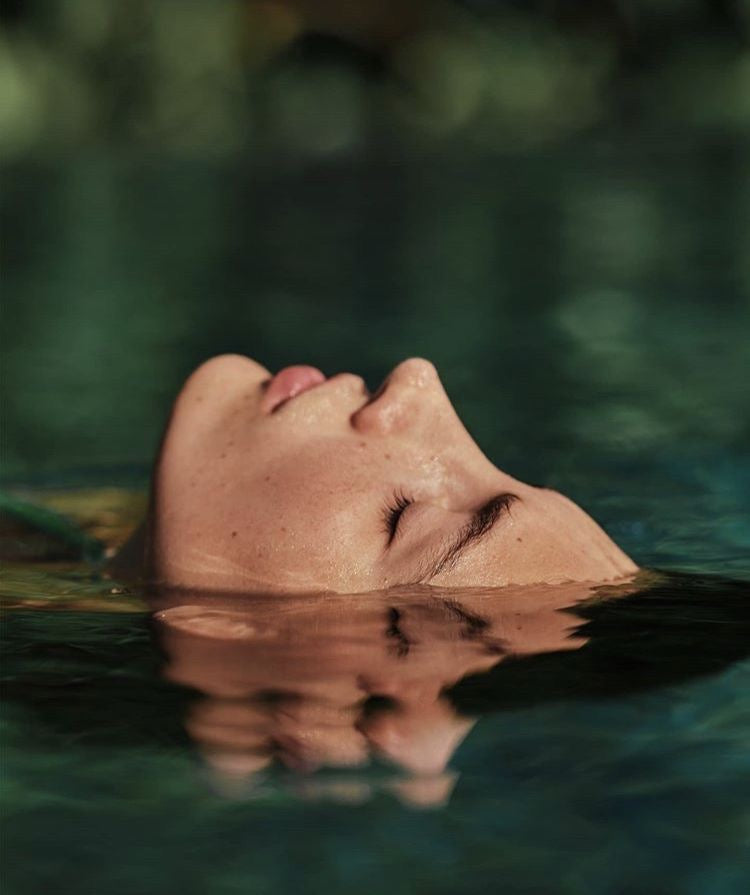 woman floating in water